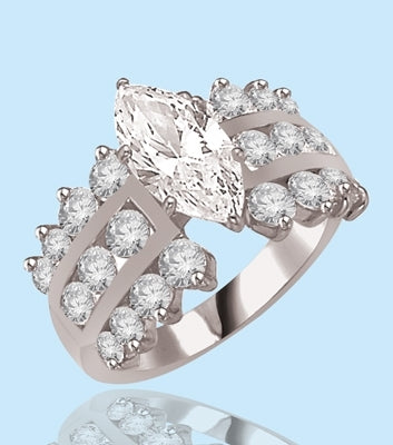 Ring-2ct marquiese cut & round channel set stones