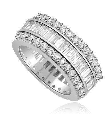 Private Pleasures - Wide Band Ring with a beautiful triple spin! Three heavenly rows of Diamond Essence Masterpieces. In the center, intimately touchinh channel set baguettes, and on both side round cut melee pieces. 5 Cts. T.W, in 14K Solid White Gold.