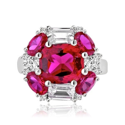 emerald cut and oval cut ruby stones with baguettes in silver ring
