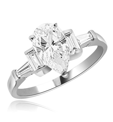A leathal combination of Diamond Essence Pear, Baguettes and Emerald to enhance your show. 3 cts.t.w set in Platinum Plated Sterling Silver.