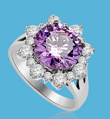 Designer Ring with Round Amethyst Essence in center surrounded by Round Brilliant Diamond Essence and Melee. 4.5 Cts. T.W. set in Platinum Plated Sterling Silver.