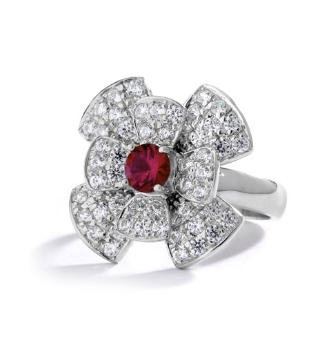 Stack of flowers - 0.65 Ct. Round Ruby Essence set in center of floral design Melee setting. 3.0Cts. T.W. set in Platinum Plated Sterling Silver.