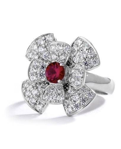 Stack of flowers - 0.65 Ct. Round Ruby Essence set in center of floral design Melee setting. 3.0Cts. T.W. set in Platinum Plated Sterling Silver.