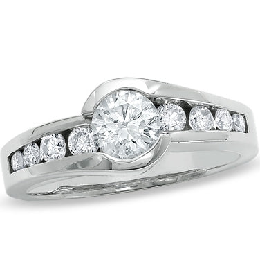 Designer Ring with channel set, 1.0 Cts. Round Brilliant Diamond Essence in center accomapnied by graduating melee on either side, 1.30 Cts. T.W. set in Platinum Plated Sterling Silver.