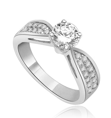Sexy and Stylish 0.75 Ct. Round Stone Ring with deep channel set round accents on the band. 1.25 Cts. T.W. In Platinum Plated Silver.