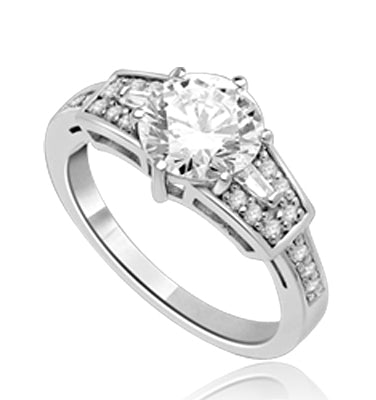 Mesmerizing 2.0 Ct Brilliant stone is adorned by superbly crafted Baguettes and Round Melee forming 2.5 Cts. T.W. In Platinum Plated Sterling Silver.