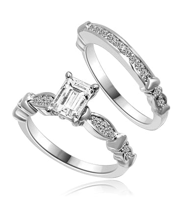 Beautiful Wedding Set with 1.0 Ct. Emerald cut Emerald Essence set in center accompanied by Melee on either side and on the matching band. 1.50 Cts. T.W. set in Platinum Plated Sterling Silver.
