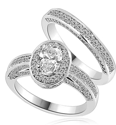 Wedding Set--1.0 ct. Oval cut Diamond Essence set in the center with melee around. Matching band with Melee. 2.50 cts.t.w. in Platinum Plated Sterling Silver.