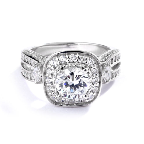 1.50 cts. Round Brilliant Diamond Essence in the center Surrounded by Melee, accompanied by Princess cut Diamond Essence and rows of Sparkling Melee on each side of the band, 3.0 cts. t.w.