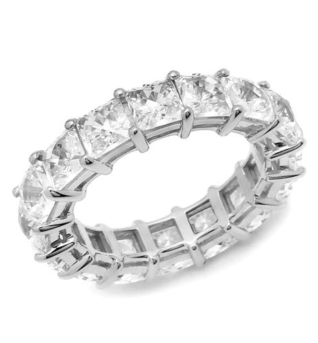 Diamond Essence Eternity Band With French Cut Stones, Approx 4 Cts.T.W. In Platinum Plated Sterling Silver.