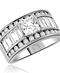 Diamond Essence Designer Ring With Princess Stone and ablaze with Baguettes and Melee, 7 Cts.T.W. set in Platinum Plated Sterling Silver.