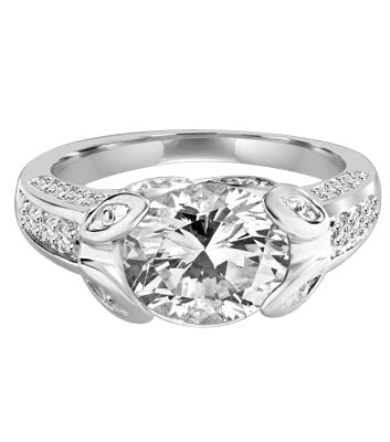 Designer Ring with 3.0 Cts. Round Brilliant Diamond Essence, artistically set in leaf shaped prongs in center, set off by Melee on either side of the band. 4.0 Cts. T.W. set in Platinum Plated Sterling Silver.