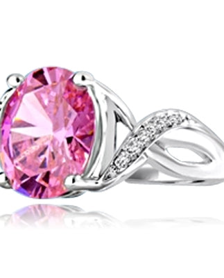Diamond Essence Designer Ring with 5.0 Cts. Pink Oval in center, accompanied by melee on band, 5.65 Cts.T.W. set in Platinum Plated Sterling Silver.