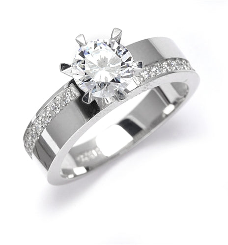 Diamond Essence Ring with 2.0ct. Round brilliant stone set in six prongs with round stones on each side, 2.5ct. tw. in Platinum Plated Sterling Silver.