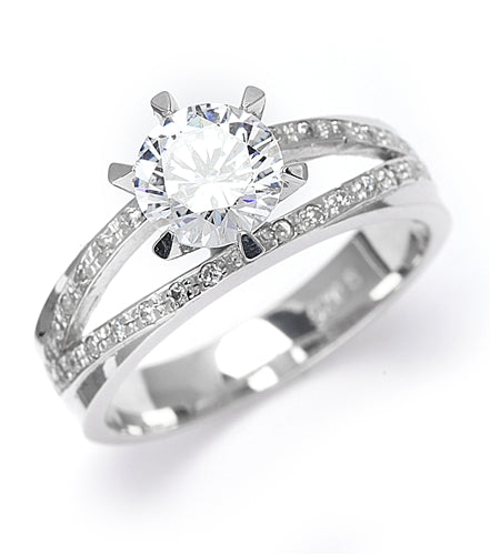 Diamond Essence Ring with 1.0ct. Round brilliant stone set in six prongs with two rows of round stones on each side, 2.10ct. tw. in Platinum Plated Sterling Silver.