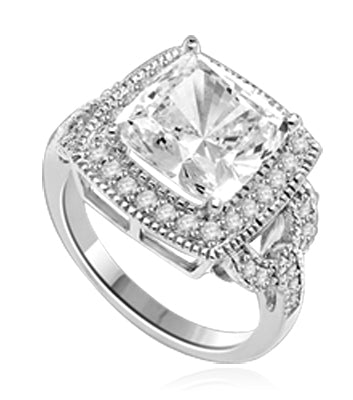 An Artstic Ring that boasts a sparkle of 4.0 Cts. Cushion Cut Diamond Essence Masterpiece with a supreme row of melee essence on the salute. In Platinum Plated Sterling Silver.