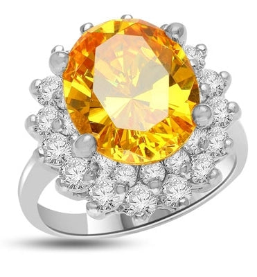 Canary Charisma! Magnificent Brilliance of 4.0 Cts. Canary Essence stone sitting on top of flower bed of 2.0 Cts. Of Round Briliant Masterpieces. Appx. 6.0 Cts. T.W.