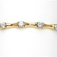 7 Inches Bamboo Bracelet with 14 Diamond Essence Masterpieces Glittering in unique prong and link setting. 3.50 Cts. T.W. Match it with the Bambooty Necklace.
