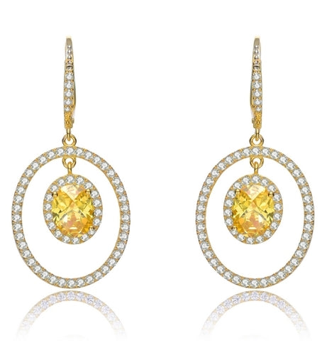 Designer Leverback Earring, with 1.5 carat oval Yellow Citrine Essence surrounded by Round Essence melee, Outlined with bigger oval setting with melee. 5.5 cts.t.w. in Gold Plated Sterling Silver.