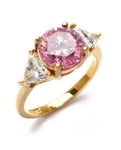 Risque- Diamond Essence Ring with 2 Carat Round Cut Pink Essence in Center and 0.5 Ct. Each trilliant cut side accents.set in 14K Gold Vermeil.