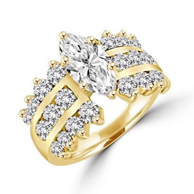 FLASH DANCE- Ever classic ring, 3.40 cts.t.w. in all, with 2.0 cts. t.w. marquise cut Diamond Essence center stone and three rows of channel set round Diamond Essence piece on each side. A virtuoso event.