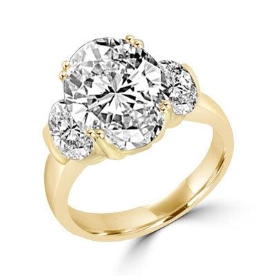 Ring oval cut stone in center and sides