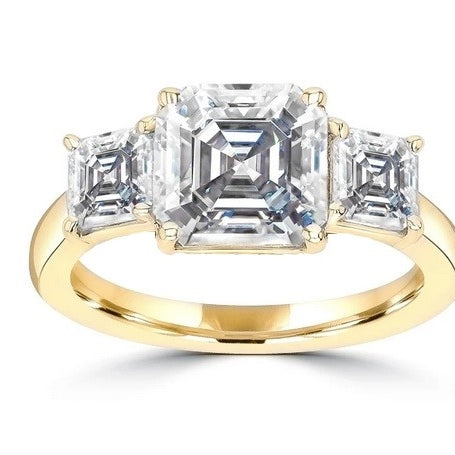 Three Stone Ring - 2.0 Carat Asscher Cut Diamond Essence Stone in the center and 0.5 carat Asscher Cut Diamond Essence stones on each side.3.0 cts. t.w.