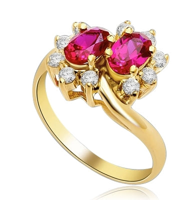 Two Ruby Oval Essence, 0.5 ct. each, set in four prongs and surrounded by melee to give floral effect. 1.20 cts. t.w. In 14k Gold Vermeil.
