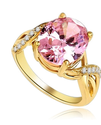 Diamond Essence Designer Ring with 5.0 Cts. Pink Oval in center, accompanied by melee on band, 5.65 Cts.T.W. set in 14K Gold Vermeil.