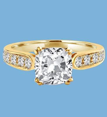 Diamond Essence Ring with 2.0ct. Cushion Cut stone set in eight prongs with round stones on each side, 3.5ct. T.W. set in 14K Gold Vermeil.