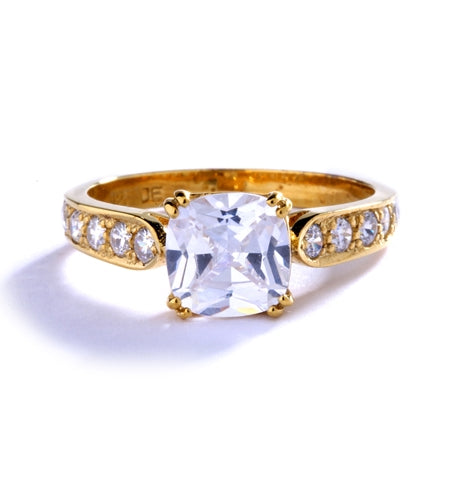 Diamond Essence Ring with 2.0ct. Cushion Cut stone set in eight prongs with round stones on each side, 3.5ct. T.W. set in 14K Gold Vermeil.