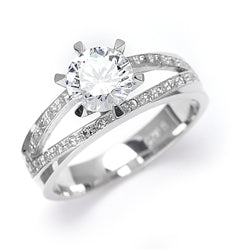 Diamond Essence Ring with 1.0ct. Round brilliant stone set in six prongs with two rows of round stones on each side, 1.20ct. T.W. set in 14K Gold Vermeil.