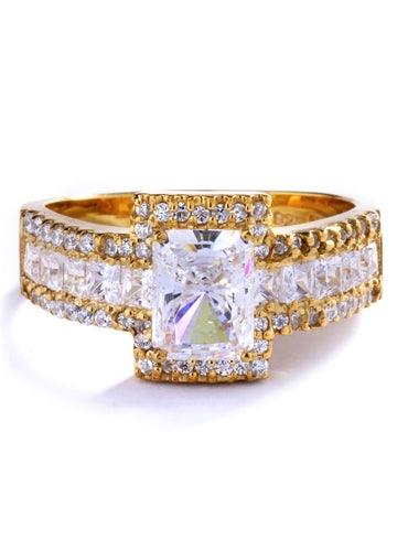 Engagement Ring - 1.75 Cts. Radiant Emerald cut Diamond Essence set in center surrounded by Round Melee and Princess cut Diamond Essence, which flows on band also, making three shinning rows on either side. 5.0 Cts. T. W.