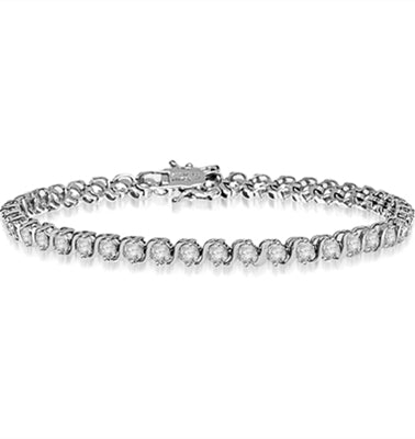 6.75 inch bracelet with S links in bezel setting. 4 cts. T.w. in 14K Solid White Gold.