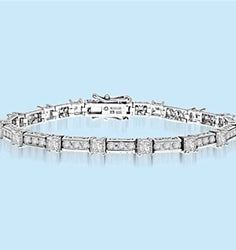 Beautiful Designer Bracelet, with Diamond Essence Princess cut masterpieces linked interestingly with cusp of round accent in ethnic looks. Appx. 7.0 Cts.T. W. in 14k Solid White Gold.