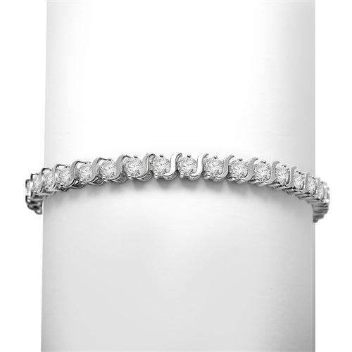 14K Solid White Gold tennis bracelet. Brilliant round stones are set in s-curve bracelets. 7.5 cts.t.w.
