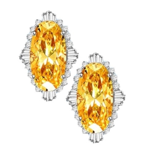 Diamond Essence Earrings in 14k Solid White Gold with Diamond essence 9.0 cts. Canary stone in the center and encircled by round stones and a large spray of baguettes on all four sides. Wear it with confidence. Appx. 21.0 cts. t.w.
