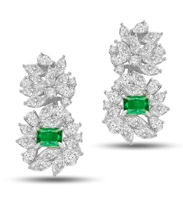 Designer earrings, just perfect for special occasions. Diamond Essence Emerald cut Emerald Essence, 1 ct. stone set in four prongs and surrounded by Marquise, Pear and Round Brilliant Essence stones in artistic floral design. 6.5 cts.T.W.