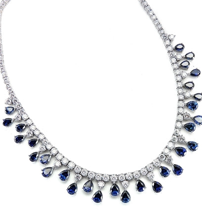 Diamond Essence dazzling Necklace, 16" long just perfect for any Occassion. 1.0 Ct. each Sapphire Essence stone dangling from Round Brilliant Diamond Essence stone. Appx. 75.0 cts.t.w. set in 14K Solid White Gold.