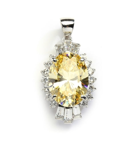 Diamond Essence Pendant in 14K Solid White Gold with 10 cts. Oval Canary in center. Round Essence and Baguettes on either side, set in prong settings, makes it a designer wear. 13.0 cts.t.w.