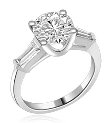 14K Solid White Gold Diamond Essence engagement ring. 1.0 ct.round brilliant stones and delicate baguette on each side. 1.25 cts.t.w. Perfect for the occassion.