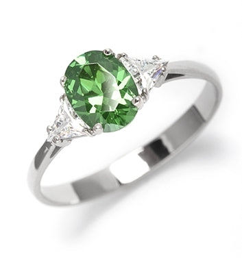 Stunning Ring, 2 Cts. T.W, with 1 Ct Oval Cut Emerald Center and White Trilliant Diamond Essence Stones on side, in 14K Solid White Gold.