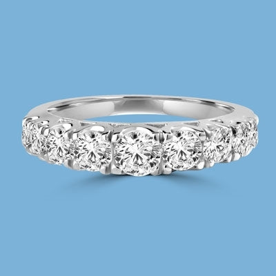 Designer Band with Beautifully set Graduating Round Diamond Essence. 1.10 Cts T.W. set in 14K Solid White Gold.