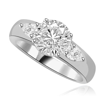 round center stone and pear shaped accents ring