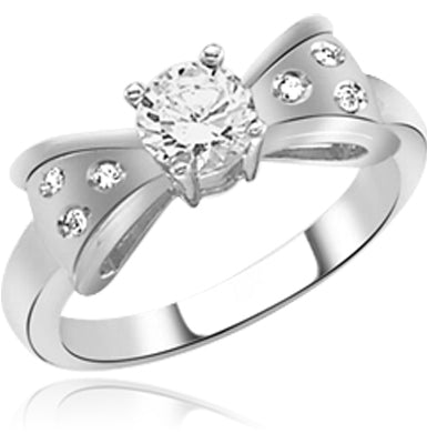 bow tie with round brilliant ring in white gold