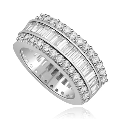 Private Pleasures - Wide Band Ring with a beautiful triple spin! Three heavenly rows of Diamond Essence Masterpieces. In the center, intimately touchinh channel set baguettes, and on both side round cut melee pieces. 5 Cts. T.W, in 14K Solid White Gold.