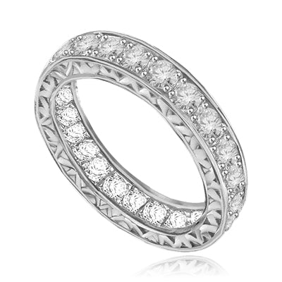 Eternity band with filigreed sides in white gold