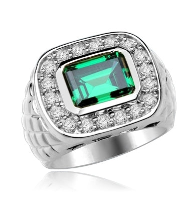 Imposing 14K Solid Whit Gold, Man's ring with a 4.0 ct. bezel-set Emerald cut Emerald center stone attended by a melee of Round cut mini masterpieces. 4.5 cts. t.w. For prime movers.