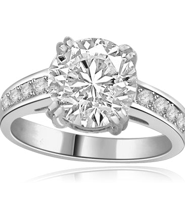 ring with 2.5ct stone in center and four round stones on sides