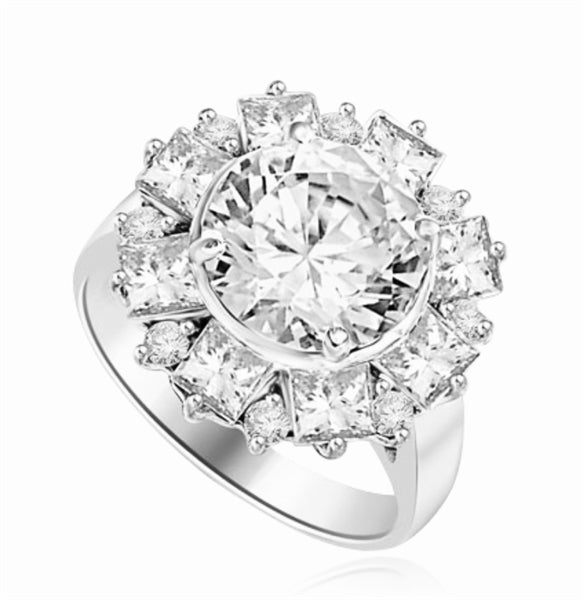 Diamond Essence Designer Ring With Round Brilliant Diamond Essence in center surrounded by alternately set Princess and melee. 7.25 Cts. T.W. set in 14K Solid White Gold.
